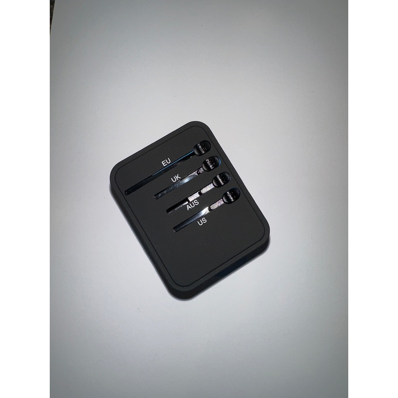 VOLTRONIX Travel Adapter.